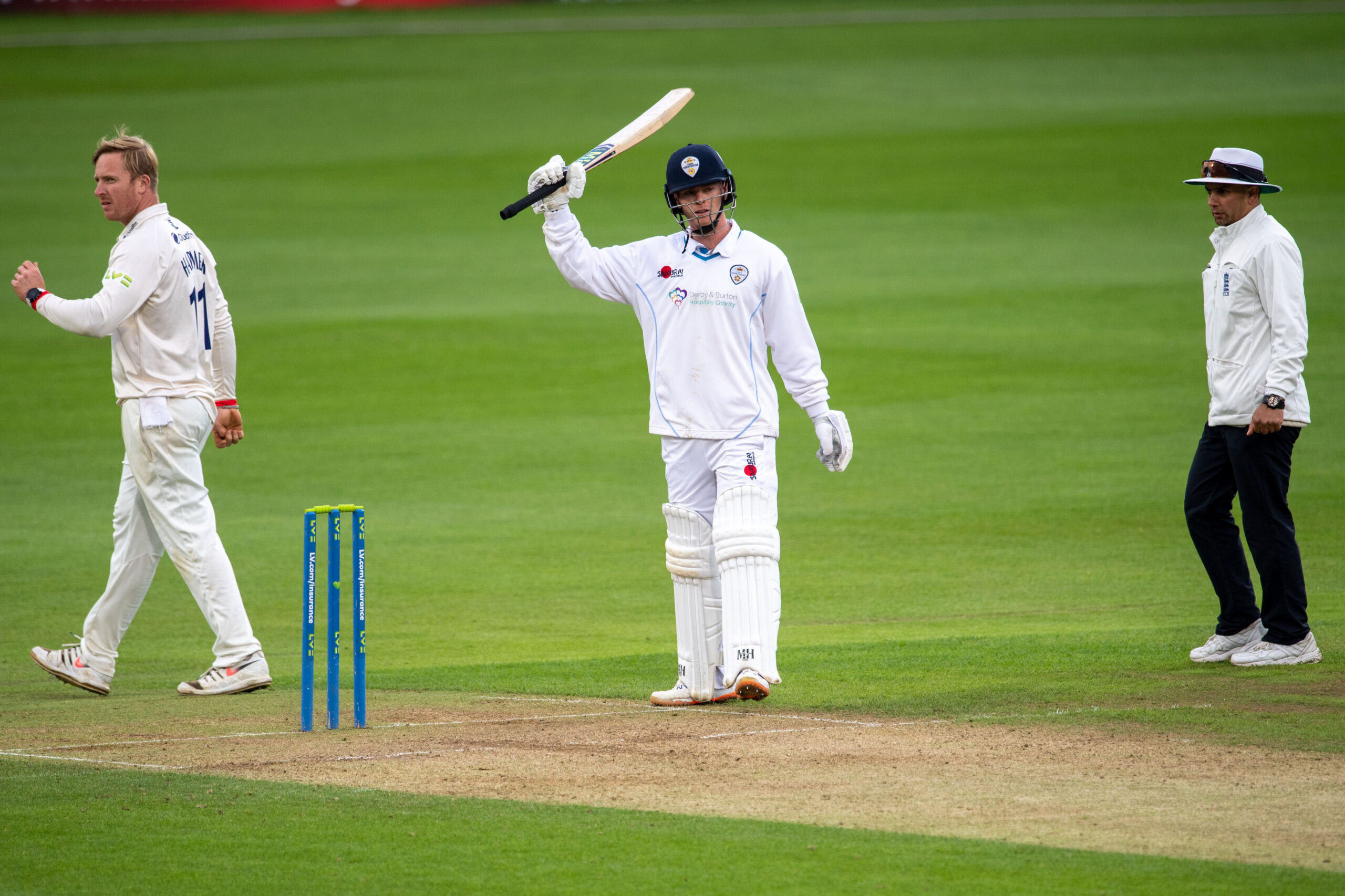 Guest hits maiden half-century on rain-affected day