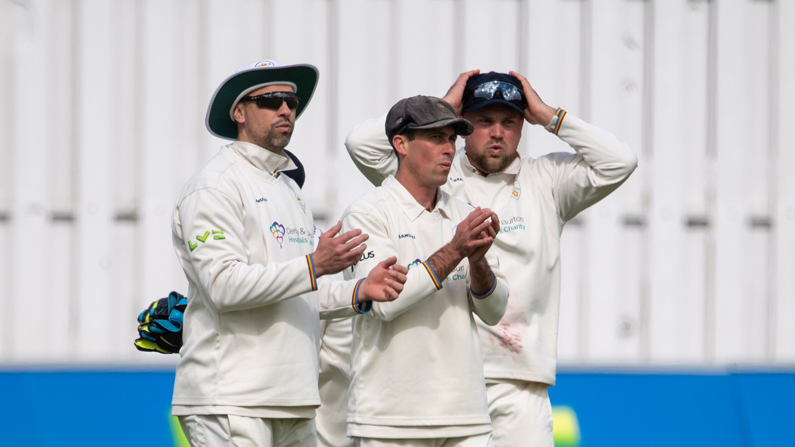 Hosts on top after tough Day One